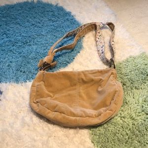 Brown purse with flower detail inside
